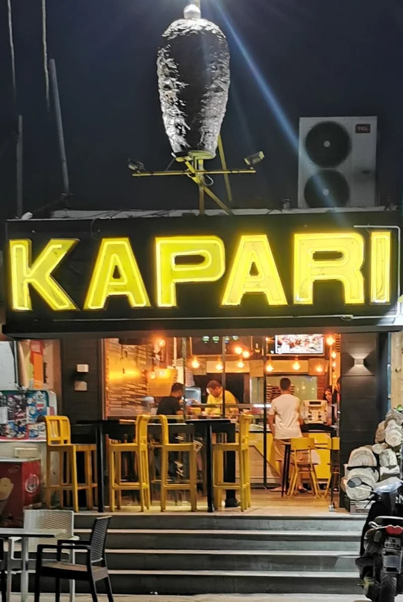 Kapari à Den Den